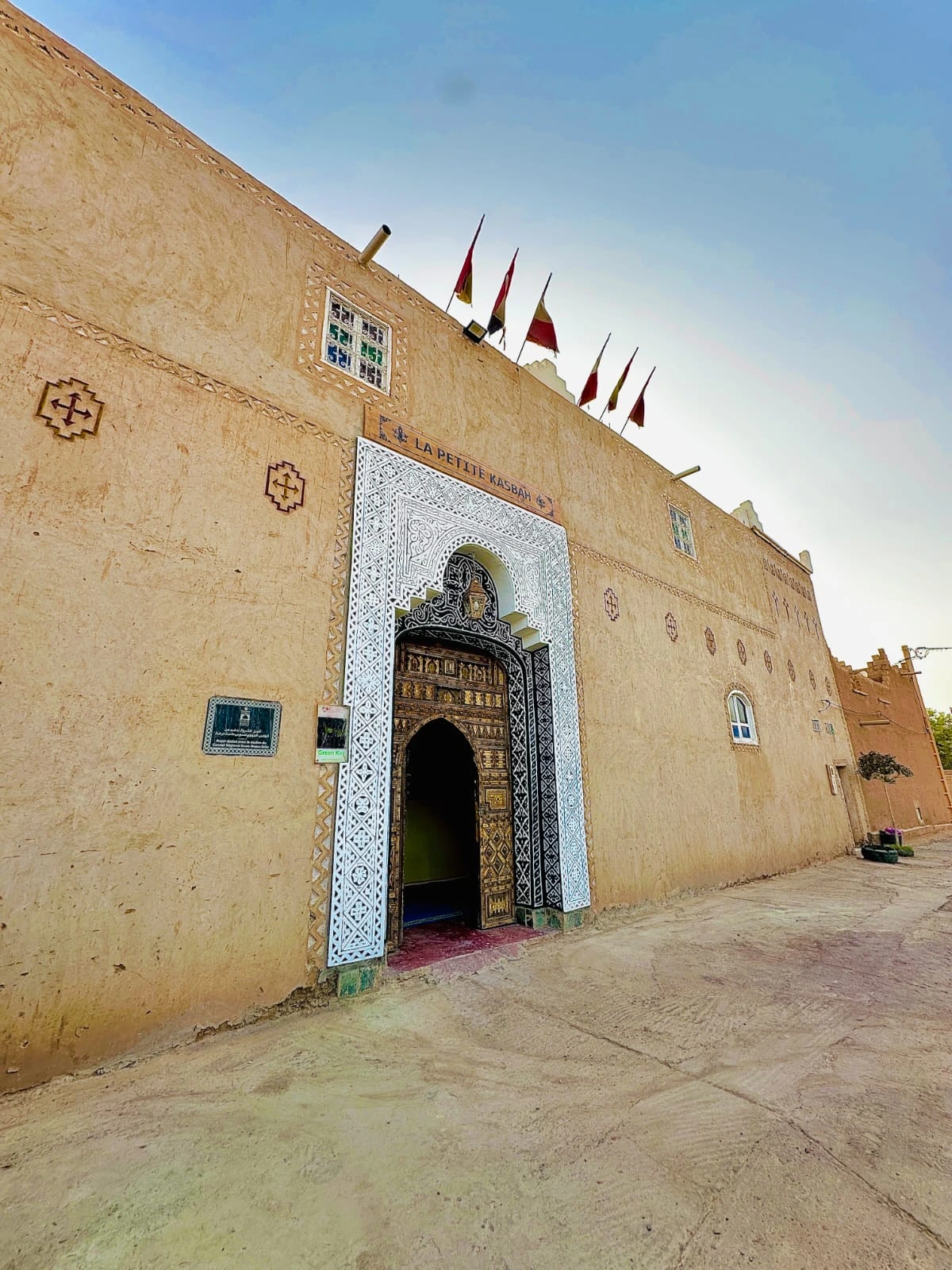 Traditional Moroccan riad architecture at La Petite Kasbah Zagora with palm grove views